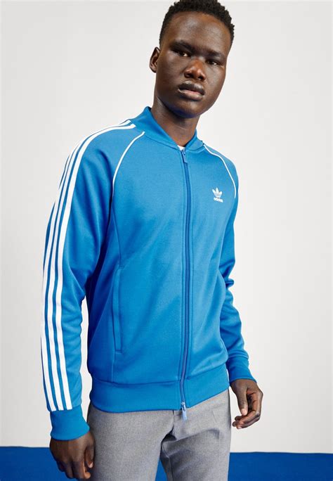 adidas original trainingsvest blauw|Trainingsjacks en trainingsvesten .